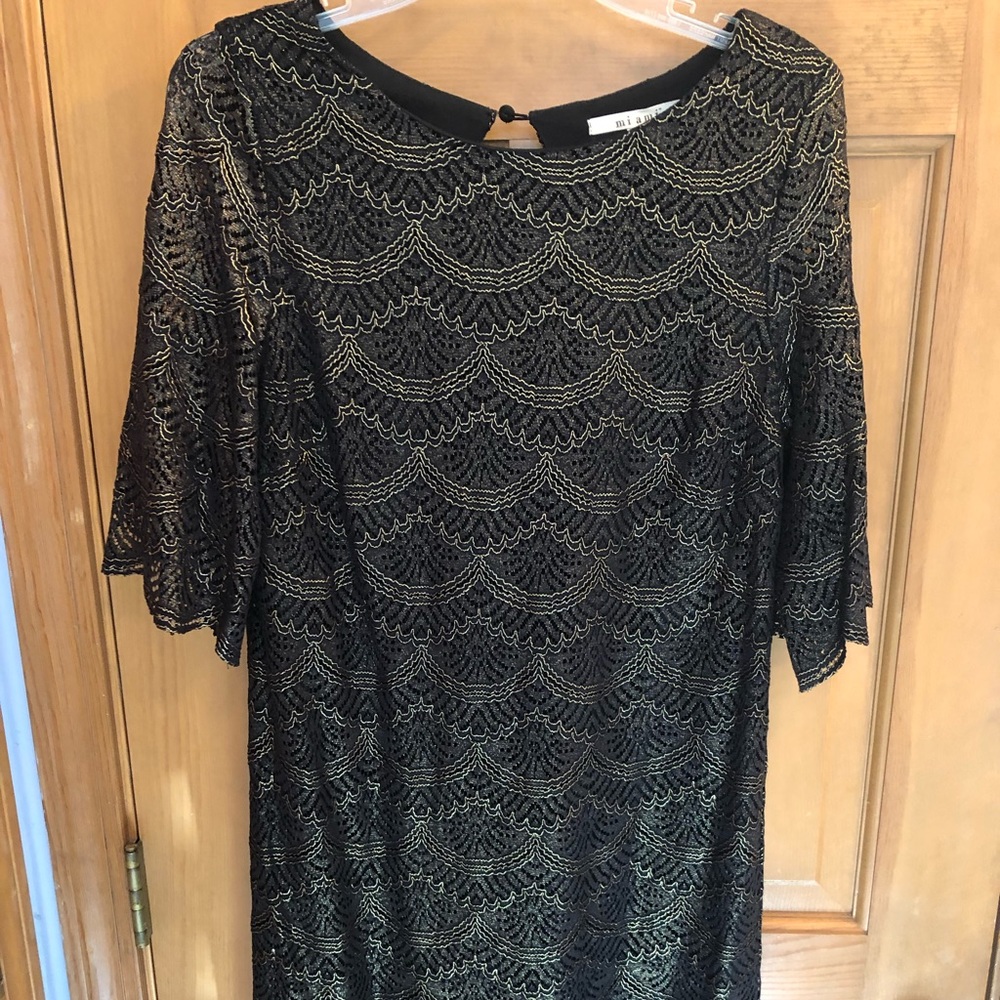 Black Dress with Gold Details